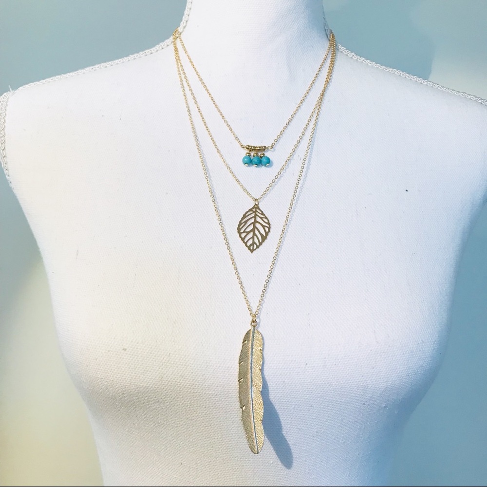 Boho three layer turquoise and gold necklace.